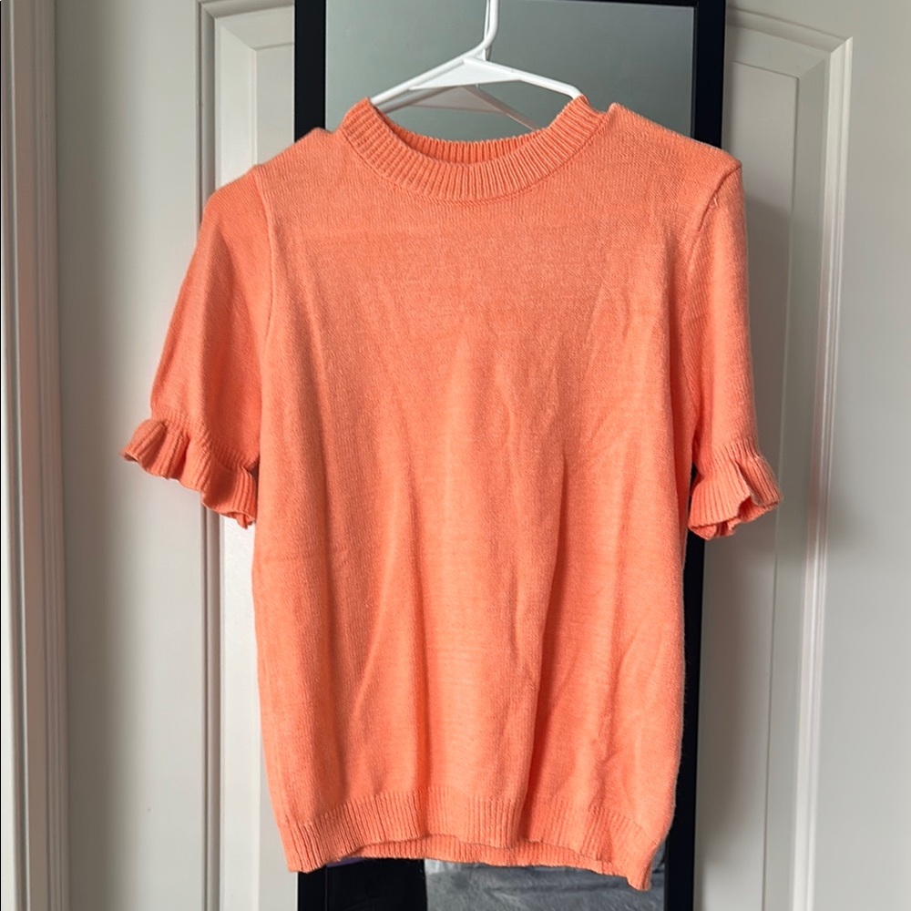 Women's orange top. New without tags